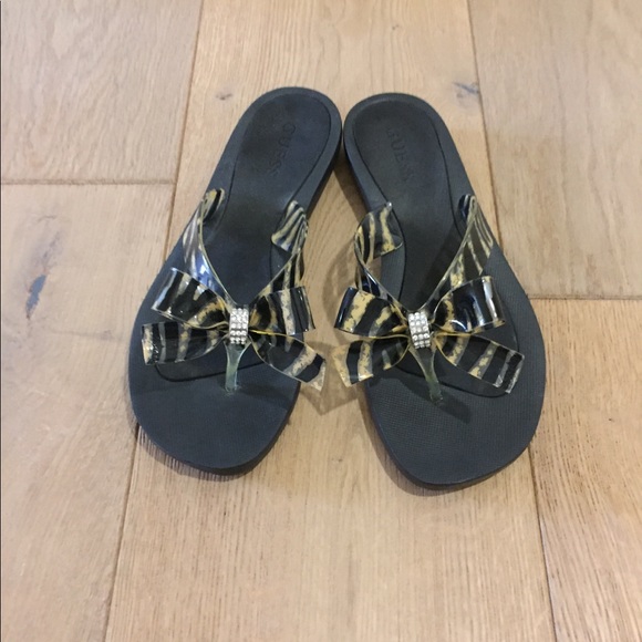 guess bow tie flip flops